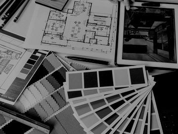Interior Designer looking over portfolio materials